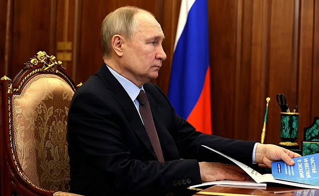 Putin Shows 'Signed Peace Agreement' with Ukraine post image